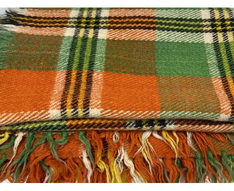 VINTAGE WOOLLEN BLANKETS (2) including a mainly red and green hatched design blanket with tasselled ends, 130 x 149cms and a 