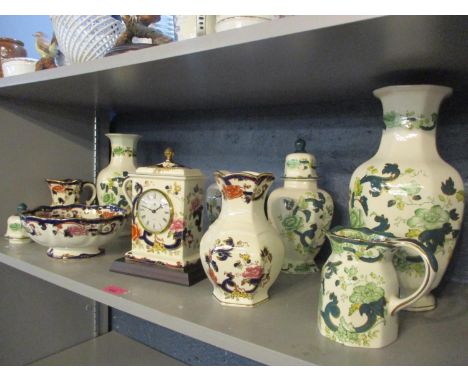 A selection of Masons china to include a mantel clock 