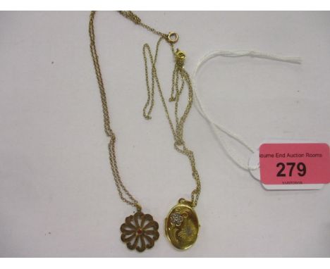A yellow metal pendant set with a ruby on a fine chain and a 9ct gold lock on a fine chain 