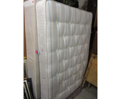 A new double bed with mattress 