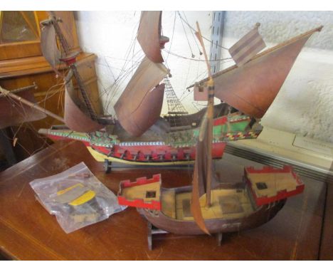 Two painted wooden model boats 