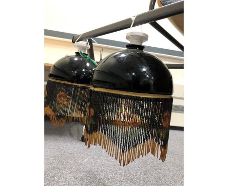 A pair of Art Deco beadwork ceiling light shades with modern fittings.