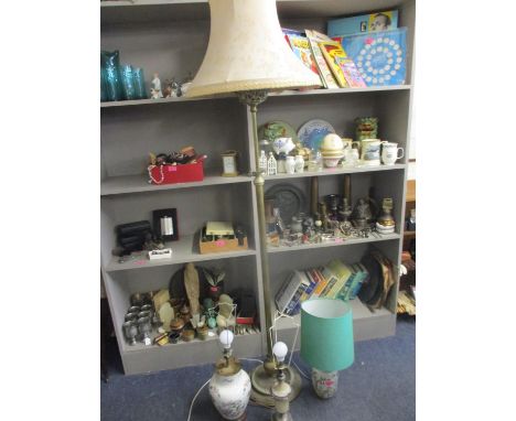 An early 20th century Chinese ginger jar converted into a table lamp, together with two other table lamps and a brass standar