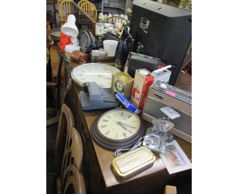 A mixed lot to include a Roberts radio, a clock, a Polaroid camera and other items 