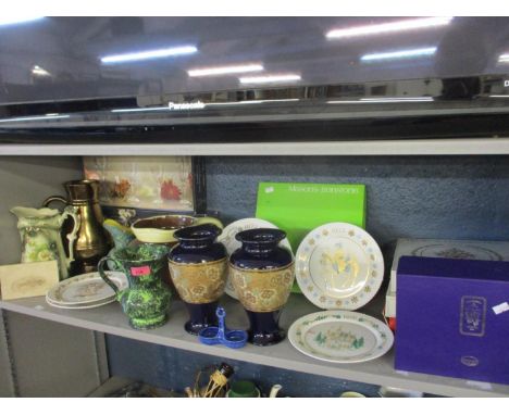 Early to mid 20th century earthenware, pottery and ceramic water jugs, together with a quantity of collectors wall plates to 