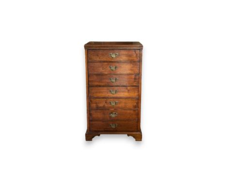 A 19th Century seven drawer mahogany wellington chest standing on bracket feet. 54cm by 46cm by 94cm high