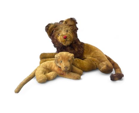 Two Steiff style mohair lions, longest 35cm  Condition: Extensive wear