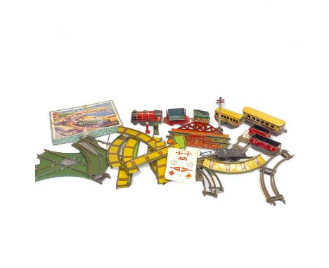 A Brimtoy/Chad Valley tin plate clockwork train set and a victory wood jigsaw puzzle of 'Seaside Traffic'