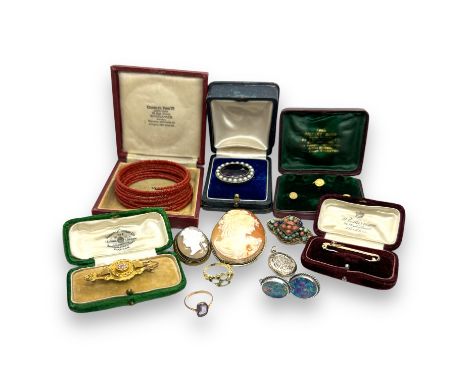 A parcel of antique and vintage jewellery. To include a &ldquo;9ct&rdquo; stamped and tested dress ring, a gilt opal, diamond