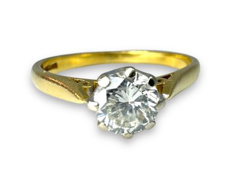 An 0.77 carat 18ct gold diamond solitaire ring. Size R1/2. Accompanied by purchase paperwork from Aurum Jersey, outlining the