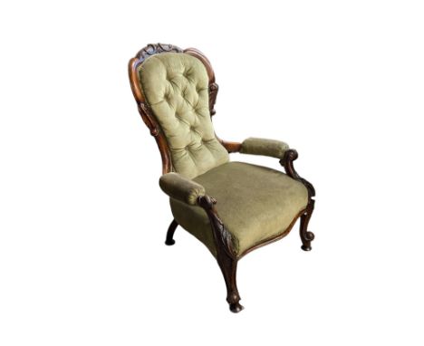 A Victorian carved walnut button back open armchair, 67cm x 76cm x 96cm high