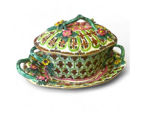 A Worcester chestnut basket, cover and stand, each piece decorated with relief flowers, with branch handles in bright enamels