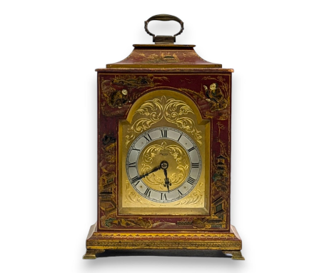 A Chinoiserie decorated bracket mantle clock retailed by Asprey. 17cm by 11cm by 26cm high. Ticks but stops, possibly overwou