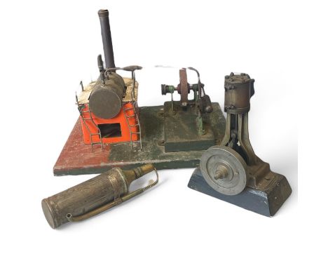 A scratch built static steam engine with an upright single piston  18cm tall