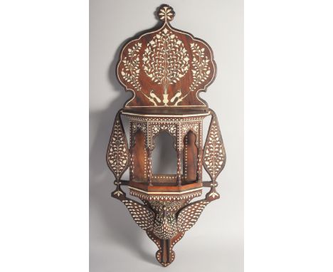 A VERY FINE 19TH CENTURY INDIAN HOSHIAPUR BONE INLAID WOODEN INLAID WALL BRACKET, the base formed as a peacock with wings out