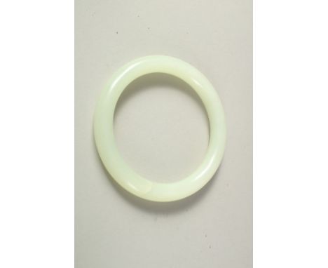 A CHINESE JADE BRACELET, in original fitted box.