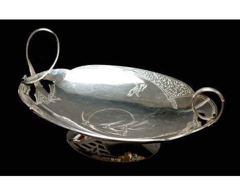 IMPERIAL RUSSIAN 'AESTHETIC' SILVER FRUIT BOWL, c.1910, oval lobed with pierced high loop handles, engraved with three swallo