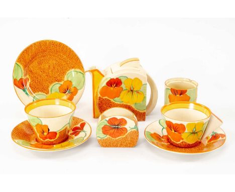 CLARICE CLIFF 'BIZARRE' PART TEA SET, 'Nasturtium' pattern, Stamford shape, comprising teapot, two cups and saucers, sugar ba