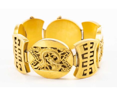YELLOW GOLD CHUNKY PANEL BRACELET, of Chinese design decorated with panels of foliage and dragon, unmarked, tests as 18ct gol