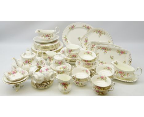 Royal Albert 'Moss Rose' seventy-five piece dinner and tea service for six, plus extras with matched sauce boat stand (76)