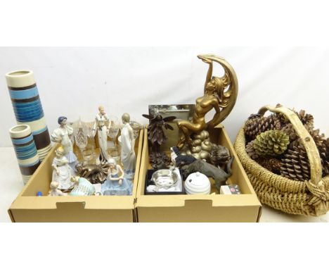 Austin Art Deco style bronzed figure of seated female nude on rocks within crescent moon, H52cm, two other similar style figu