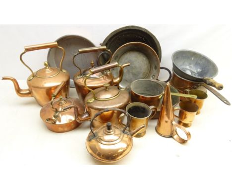 Four 19th century and later copper kettles, 19th century copper tankard measures by Oldham, Nottingham, copper cooking pans, 