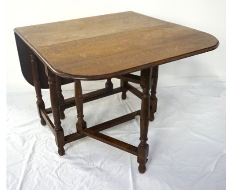 1920s OAK DROP-LEAF TABLE
138cm long (open) x 91.5cm wide, raised on turned gate-leg support frame