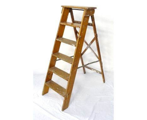 SET OF VINTAGE PINE STEP LADDERS
with six steps and folding metal support stretcher, 122cm high