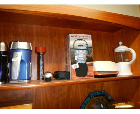 A mixed lot of household items, wind-up lantern, torches etc.,