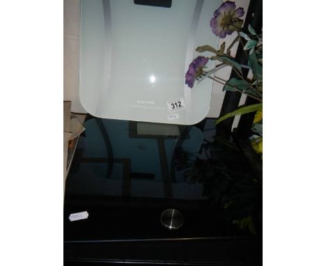 Two sets of bathroom scales.