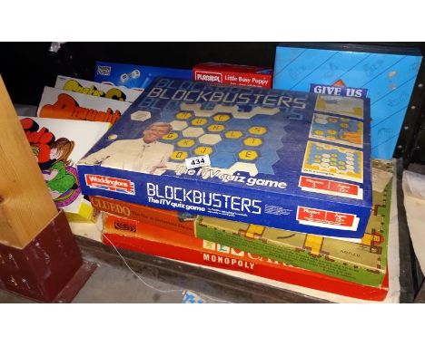 A shelf of vintage games including Cluedo &amp; Monopoly etc.