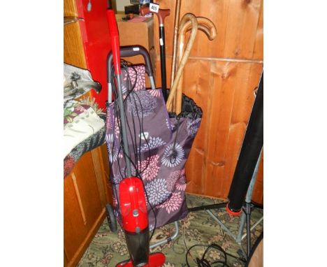 A shopping trolley, walking stick and steam cleaner. COLLECT ONLY.