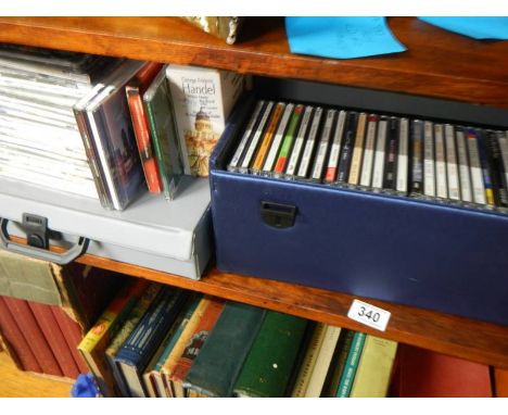 A shelf of assorted CD's.