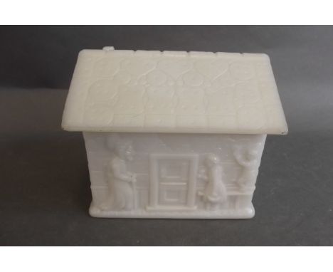 A C19th German milk glass trinket box in the form of a cottage with Hansel, Gretel and The Old Witch, 4" high 