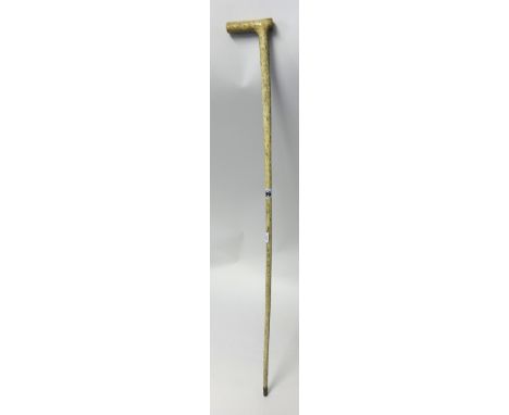 A whale bone walking stick, early 20th century.