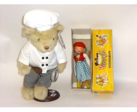 A Pelham puppet (boxed), 'Dutch Girl', t/w a modern bear 'Chef Bear'.