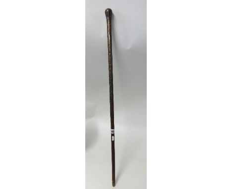 Hardwood walking stick having intricate pique inlaid decoration, length 88cm.