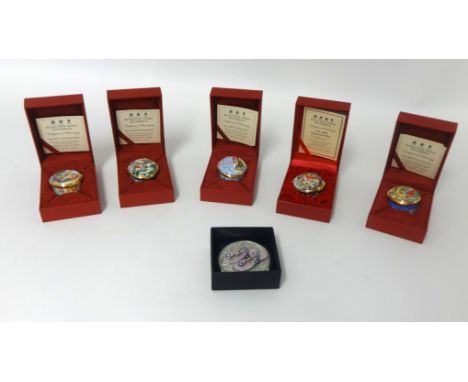 Five Halcyon Days pill boxes and a Daniel Creations compact.