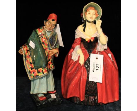 Two Royal Doulton bone china figurines: 'Marjorie', HN1413 and 'The Carpet Seller', HN1464. (2)