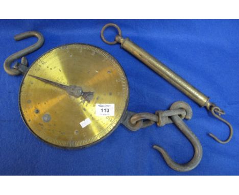 Pair of Salter's lacquered brass and iron butcher's hanging scales together with a pair of 60lbs cylinder hanging scales. (2)