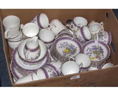 19th Century Staffordshire teaware on a white ground with Chinese figures and pagodas comprising: teacups; saucers; milk jug;