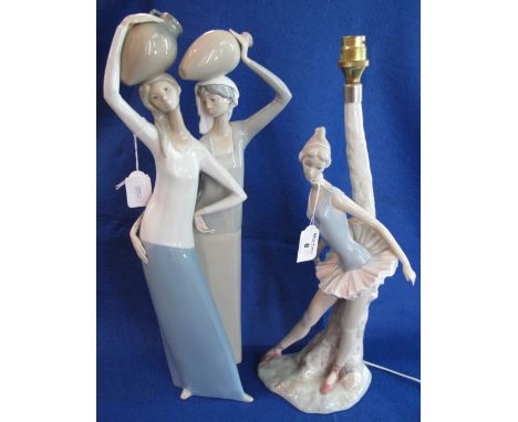 Lladro porcelain figure group, two female water carriers, impressed marks, together with a Nao porcelain figure in the form o