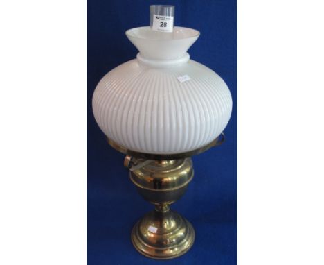 20th Century brass double burner oil lamp with brass reservoir and pedestal base, fluted white glass shade and clear chimney.