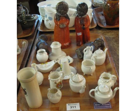 Tray of various crested ware items to include: Genie lamp; teapots; vases etc. together with Inuit type pottery figures.