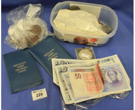 Tub of assorted coins and notes to include various GB and some foreign, some mounted into bar brooches, pennies, crowns etc. 