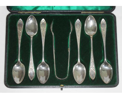 A cased set of six late Victorian bright cut engraved silver teaspoons and matching sugar tongs, Thomas Bradbury &amp; Sons, 