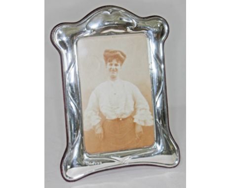 A contemporary Art Nouveau style hallmarked silver photo frame, height 19cm.  