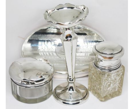 A mixed lot of hallmarked silver comprising a brush, a vase and two silver topped glass jars.  