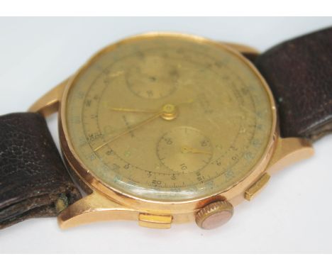 A vintage Titus Geneve chronograph, circa 1940s, having signed copper coloured dial with subsidiary dials at 3 &amp; 9 o'cloc