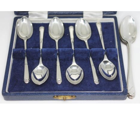 A cased set of six hallmarked silver teaspoons and another three hallmarked silver spoons.  
